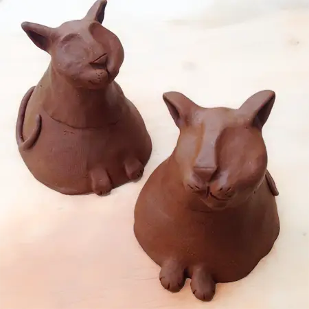 The first 2 cats in their leather-hard stage