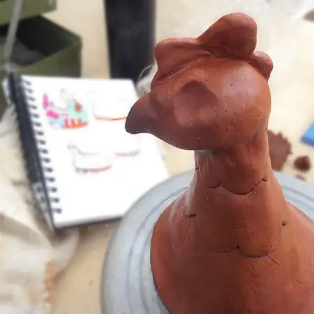 A few sketches along with the first chicken sculpture.