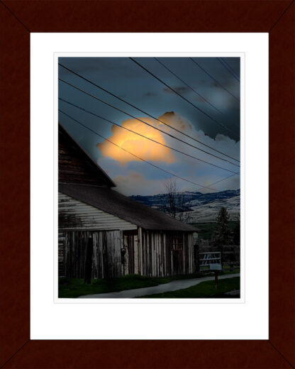 Ashland sunset cloud with deep dark blues and bright reddish-yellow - Framed