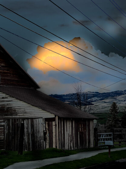 Ashland sunset cloud with deep dark blues and bright reddish-yellow